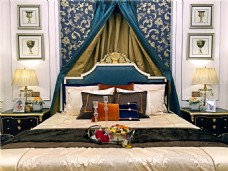 装修花纹现代时尚卧室蓝色金丝花纹床头室内装修图