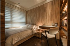 现代文艺卧室木制花纹背景墙室内装修效果图